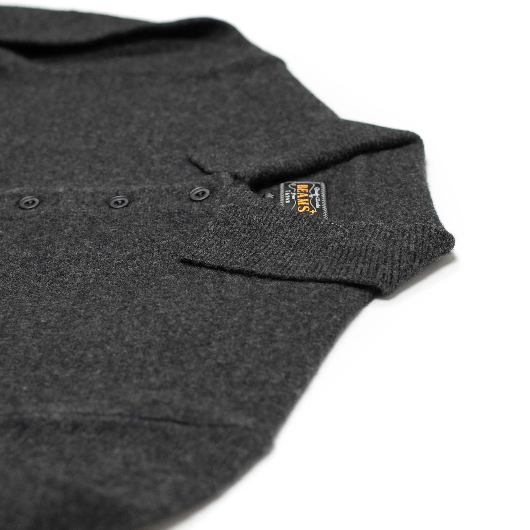 Knit polo in charcoal grey wool