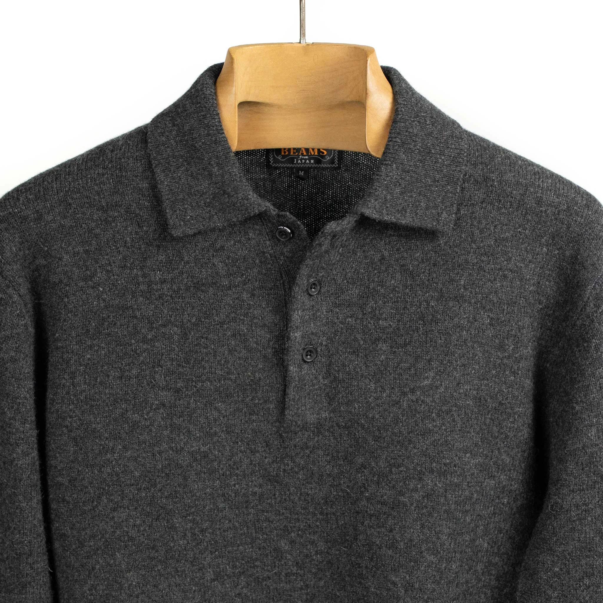 Knit polo in charcoal grey wool